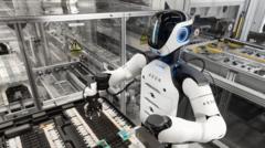 BMW pristato humanoidinius robotus automobilių gamyboje Europoje