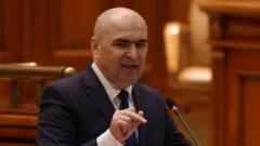 Rumunijos premjeras Ilie Bolojan pašalintas po nepasitikėjimo balsavimo